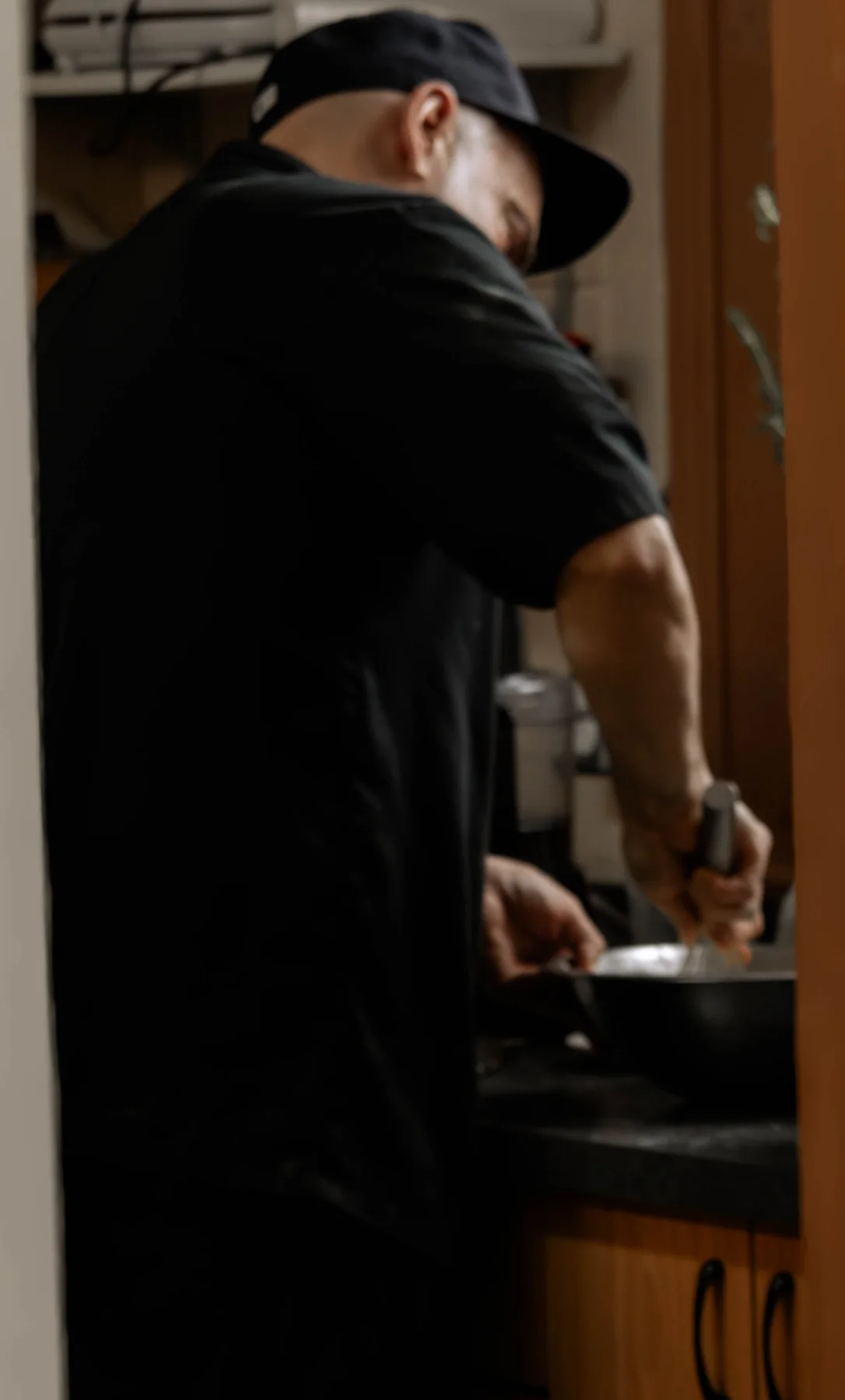 Carm preparing food in the kitchen