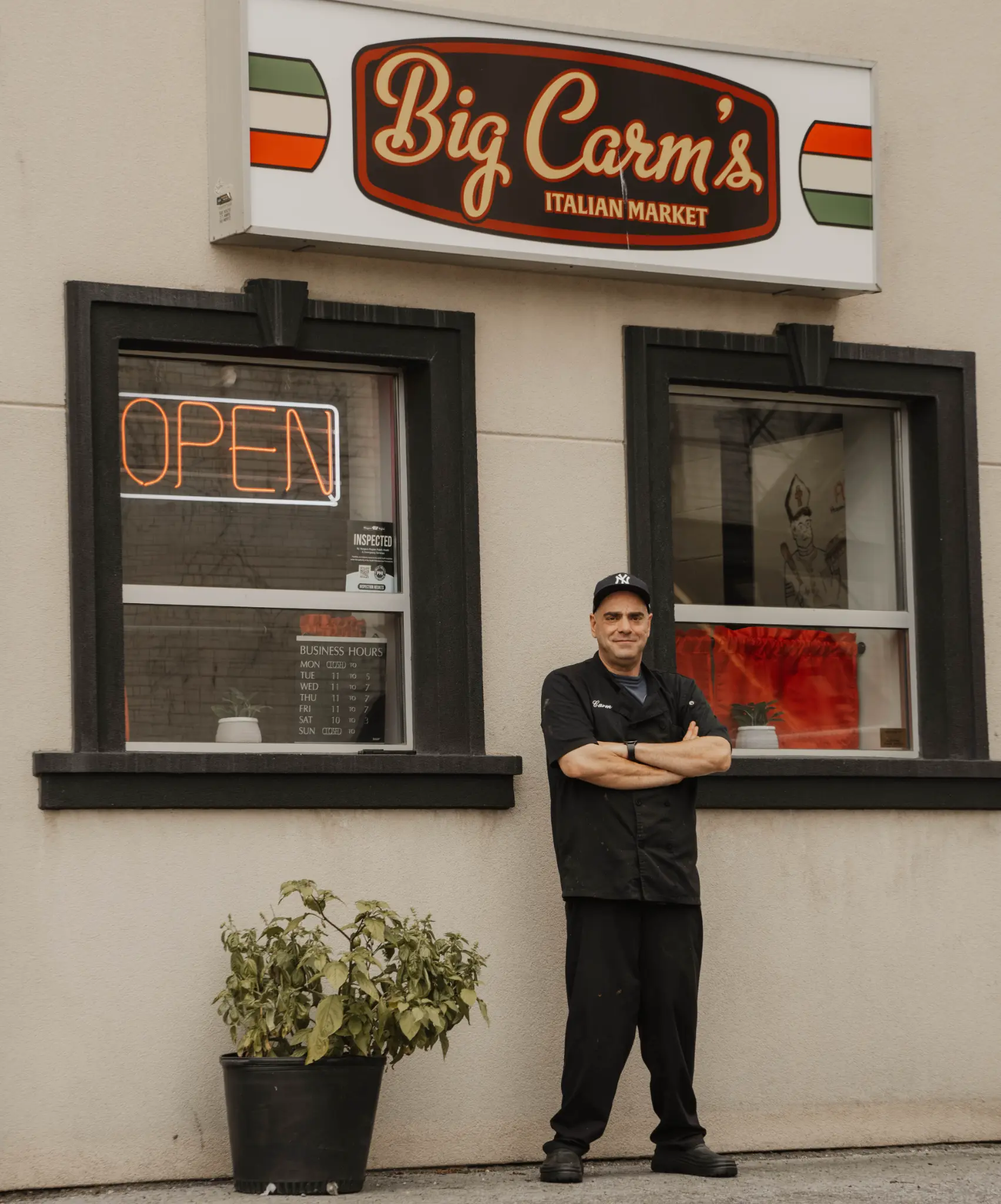 Carm standing outside Big Carm’s Italian Market at 66 Division Street in Welland